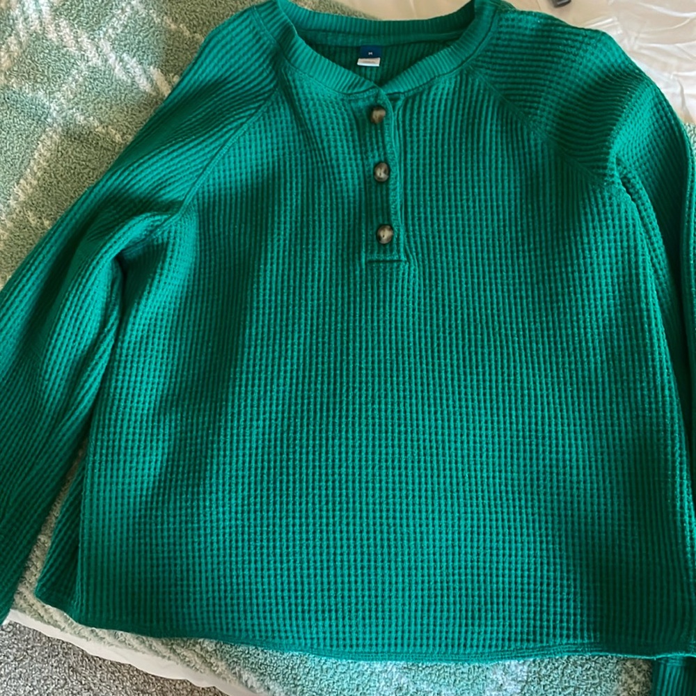 green sweater